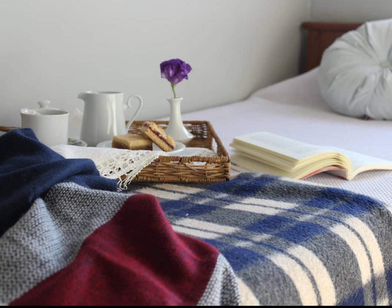Cuarto con cama del espacio de Expand Portal Buenos Aires